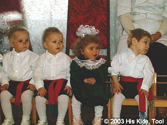 This group patiently waits for their turn to dance.