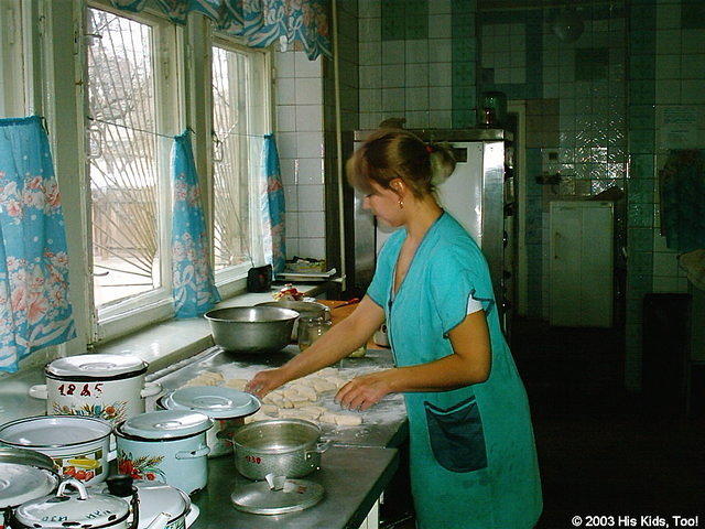 This orphanage cook prepares delicious meals each day for the 50+/- residents of this facility.