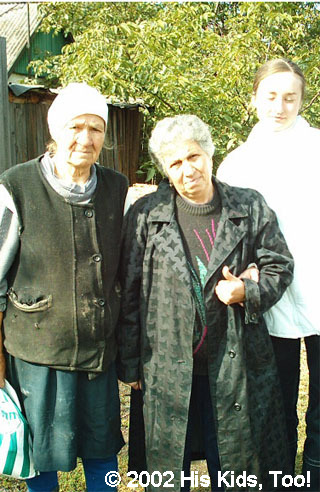 Feeding widows is an important part of the work of His Kids, Too!, and this trip was no exception. Above, sisters, Liza and Lena