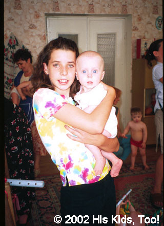 His Kids, Too! Volunteer, Haley loves to hold