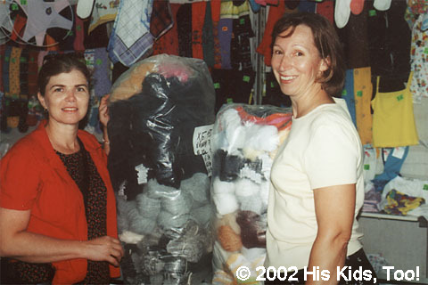 Thanks to the Hamilton family, His Kids, Too! director Teresa Fillmon and board member Faye W. were able to purchase over 1000 p