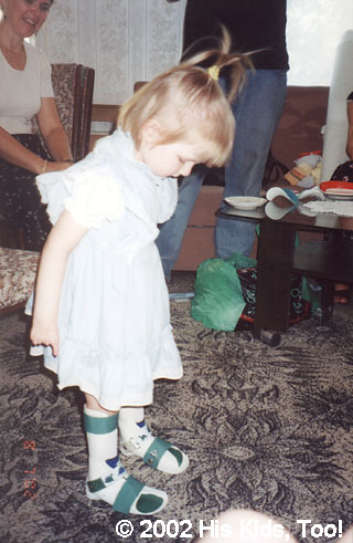 Taking a look at her new "feet." (she has legs but no feet)
