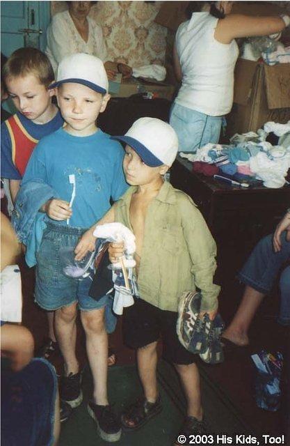 Group of boys - These boys are pleased with their new clothing, shoes and