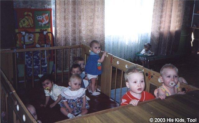 Children playing in the huge indoor playpens.