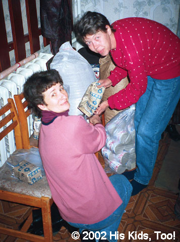 Local ladies bible study working together measuring salt portions for food bags