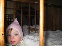 This little one is cute as can be with their new warm hat, and beautiful blanket.