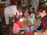 The older kids enjoy the markers brought by Dave and Fami!
