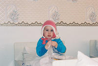 Though it wasn't too cold, this little girl perfers to sleep in her hat.
