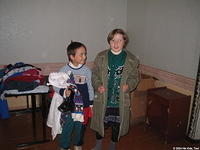 Lara and her friend appreciate their new clothing!
