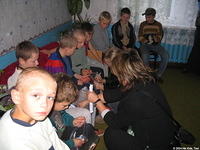 The older boys appreciate their personal care bags, and they especially like the sports equipment.