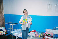 Christina, with the donations on the first trip...