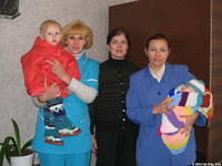 His Kids, Too! director is pictured with the head Dr., head nurse, and the 2 orhans that are leaving the hospital.  Thank you El