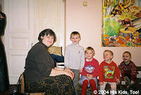 The children love the attention that Lynn gives them.