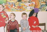 This little girl in red was quite camera shy.