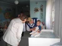 Lynn visits with this little boy.