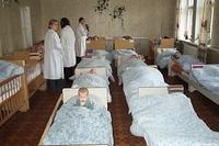 These 'lumps' under the blankets are children!