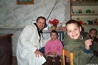 Dave enjoys visiting with the children.