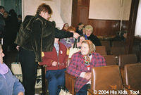 Sveta, a widow herself, helps hand out the food bags.