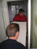 Victor one of the Donetsk food recipients gets a 'new' refridgerator.