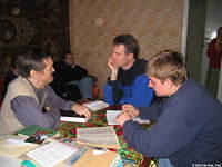 Victor has been open to studying the Bible, here, he, Ray and Vanya study with him.