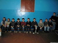 This is a handsome group of young men.  All the children received bananas while they waited for their clothing.