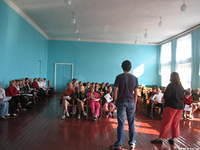 They listen attentively.