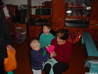 The children were so excited, they didn't want to take off their old clothes, but just put the new over them.
