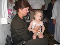 Teresa F. is pictured with the little girl that was receiving the therapy.