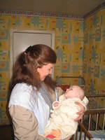 His Kids, Too! director, Teresa Fillmon, holds this 4 month old baby in her new  Winnie the Pooh sleeper, thanks Anne H.