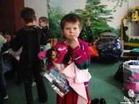 Oksana has an arm load of clothing, shoes and more!