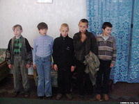 Some of the 45+ children who wait to be serviced with clothing, personal care bags, and more.