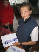 Alex, a talented artist, spoke english, and we subsequently offered him new art supplies.