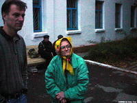 His Kids, Too! member, Ray, has a conversation with this 82 yr. old woman.  She is sleeping at this shelter, due to her children