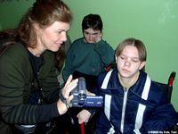Anna enjoys looking at herself on the video camera.