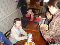Children wait patently for their treats.