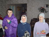 The young girl in the purple coat was bedridden at our last visit, so it was wonderful to see her up and around.