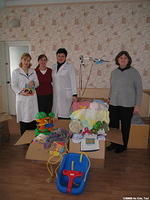 This facility was thrilled by the outpouring of your generosity. Pictured here is His Kids, Too! staff, orphange director and a