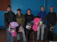 The teen girls are happy with their clothing and personal care bag.