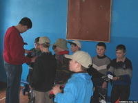 The boys enjoy talking wi th Denis.
