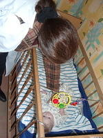 Teresa interacts with the babies.