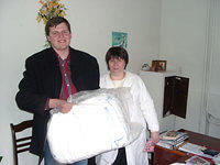 His Kids, Too! board member, Denis, presents over 200 clothe diapers to the Teremok Ortho. hospital, special thanks to Walter St