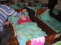 Every child needs the touch of a mother; Peggy reaches out to this boy.