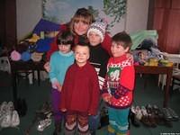 Erin is happy to pose with these 4 great kids!