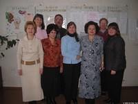The team with a director, and city officials.