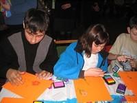 Children enjoy the stamp art craft.