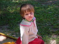 This precious girl waits for her hug...and she does get several!