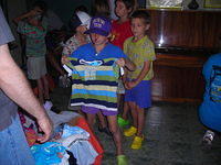 Children go through and choose the clothes they would like.