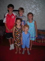 All,  once orphans of Ukraine, Aloyna, Aloysha, Alla, and Artur, and their friend (Aloysha's brother), Daniel.