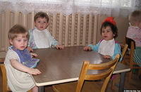 These children from the older group, await their food.