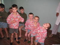 These young boys just came in from outside, and were washing before eating.